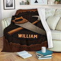 Carpenter blanket draped over a sofa with rustic hand saw and hammer artwork
