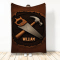 Carpenter throw blanket featuring a hand saw and hammer in a rustic woodworking badge design
