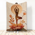 Yoga throw blanket with a meditating figure, warm autumn leaves, and earthy botanical artwork
