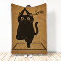 Yoga black cat blanket with cute cat balancing in a yoga pose on a mat and minimalist warm brown background