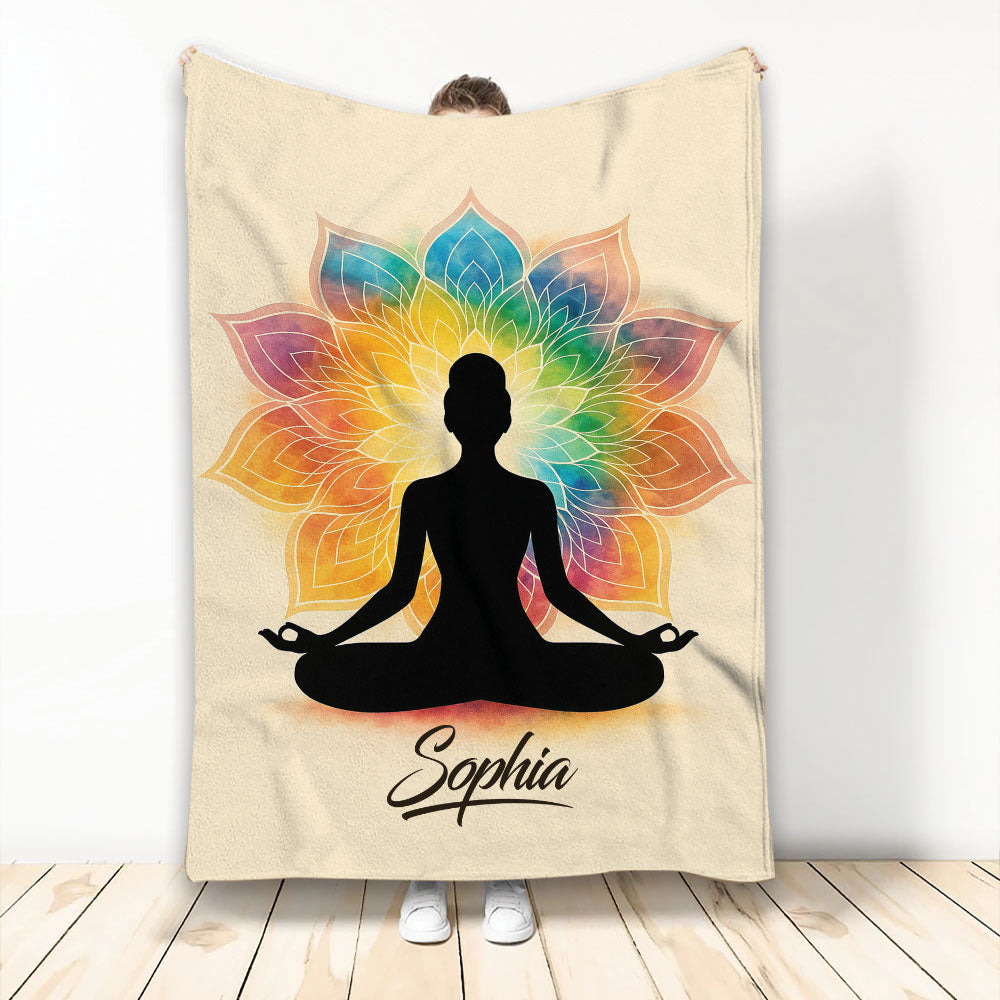 Yoga blanket featuring a seated meditation silhouette against a colorful rainbow mandala