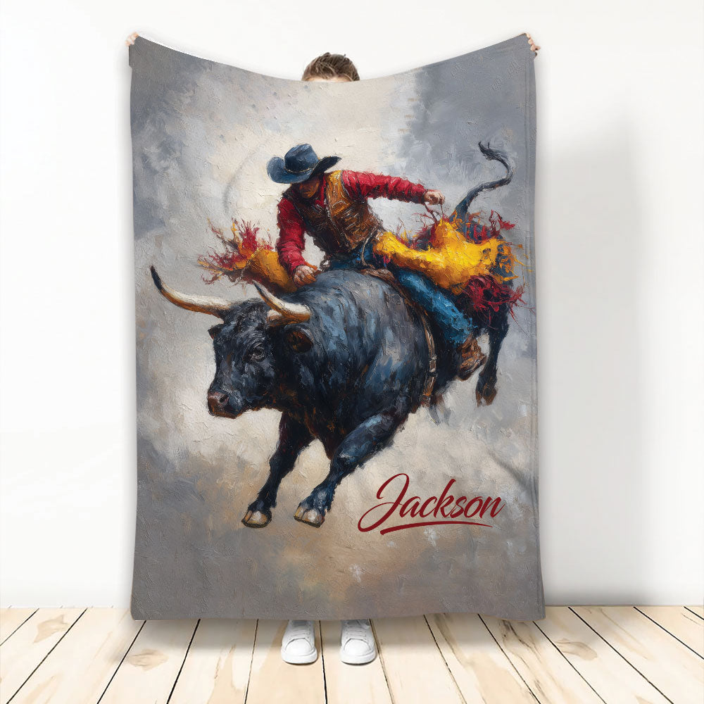 Rodeo throw blanket featuring a dramatic bull rider and black bull in painterly western artwork