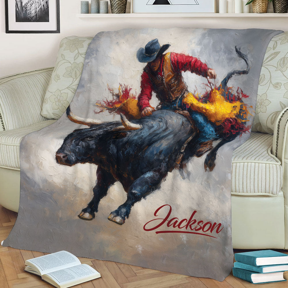 Close lifestyle view of a rodeo throw blanket with colorful bull riding artwork on a sofa