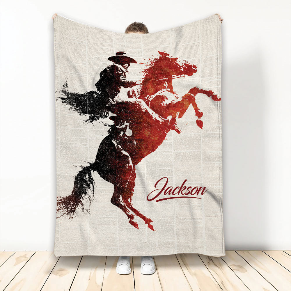 Rodeo throw blanket featuring a dramatic bull rider silhouette in black and red western artwork