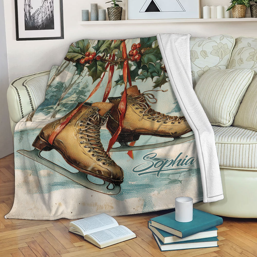 Ice skating throw blanket featuring vintage skates and winter holly artwork draped over a sofa