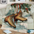 Vintage ice skating blanket with detailed skates, snowy scenery and festive holly design on a couch