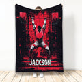 Weightlifting throw blanket featuring a barbell lifter in bold red and black athletic artwork