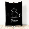 Black weightlifting blanket featuring white barbell deadlift artwork on a bold monochrome design