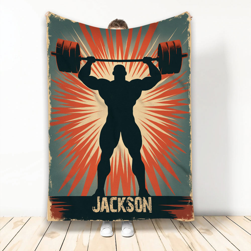 Weightlifting throw blanket with a barbell lifter silhouette, retro sunburst artwork, and distressed gym-inspired colors