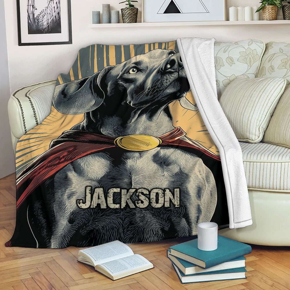 Weimaraner blanket draped across a cozy sofa, showcasing a dramatic dog illustration in warm gold and red tones