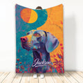 Colorful Weimaraner dog artwork on a custom throw blanket displayed upright