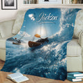Whitewater kayaking throw blanket displayed across a sofa in a cozy living room