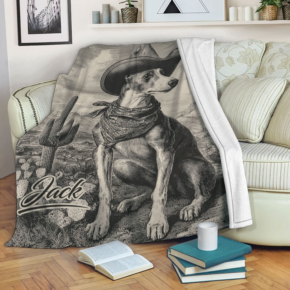 Western Whippet throw blanket displayed on a sofa with desert landscape and cactus artwork