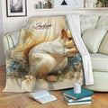 Squirrel throw blanket with botanical artwork draped over a living room sofa
