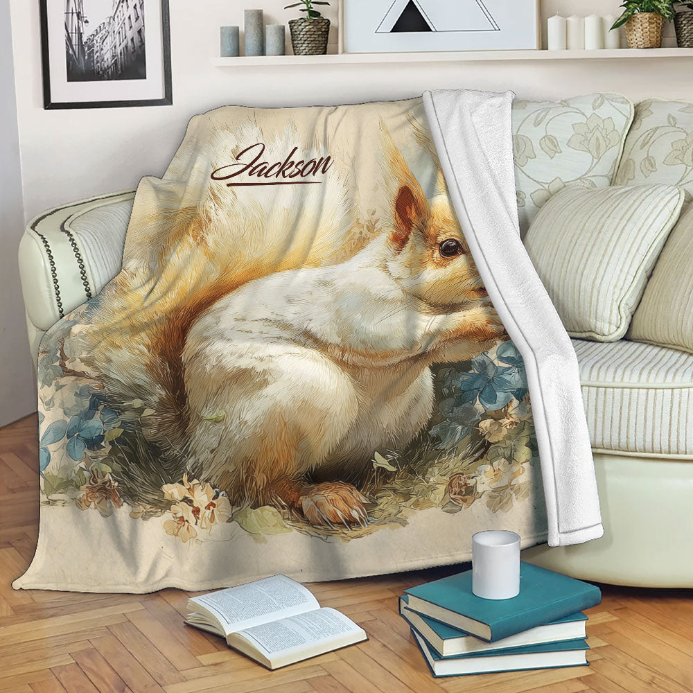 Squirrel throw blanket with botanical artwork draped over a living room sofa