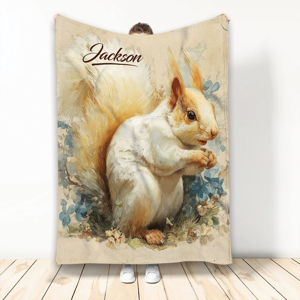 Illustrated squirrel blanket with floral woodland artwork displayed by a person
