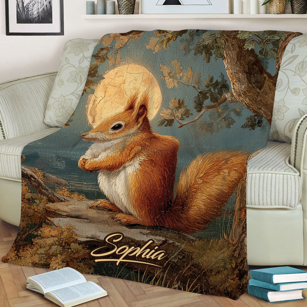 Woodland squirrel throw blanket displayed on a sofa with moonlit forest artwork