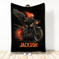 Biker blanket featuring a fiery winged skull rider on a motorcycle in black and orange artwork