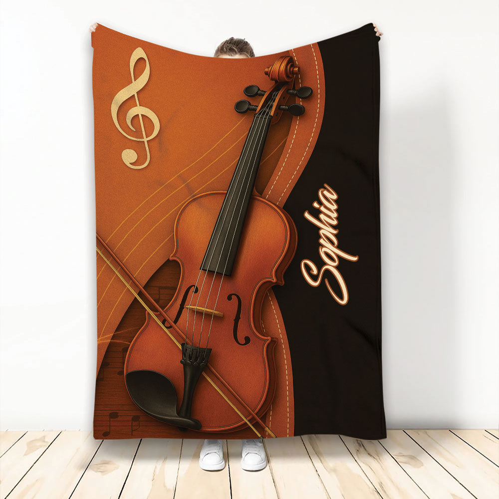 Violin throw blanket featuring a detailed violin, bow, musical note, and warm brown music-themed artwork