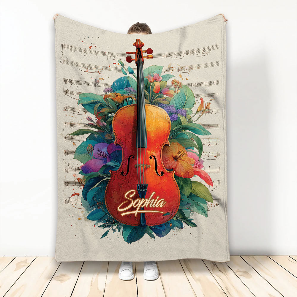 Violin throw blanket with colorful floral artwork, musical notes, and a rich red-orange instrument