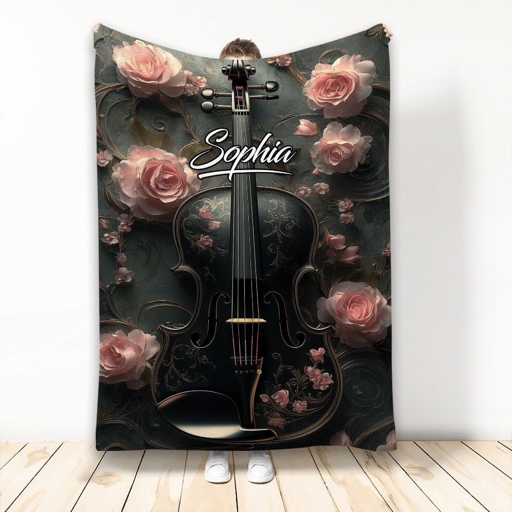 Black violin blanket with ornate pink roses and elegant musical artwork displayed as a full-room cover
