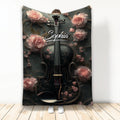 Black violin blanket with ornate pink roses and elegant musical artwork displayed as a full-room cover