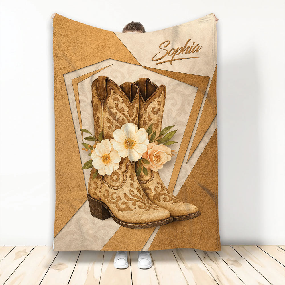 Cowgirl throw blanket featuring ornate Western boots, floral accents, and warm rustic artwork
