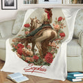 Western cowgirl riding artwork with roses displayed as a cozy living room throw blanket