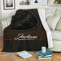 Black horse throw blanket draped over a sofa in a cozy living room