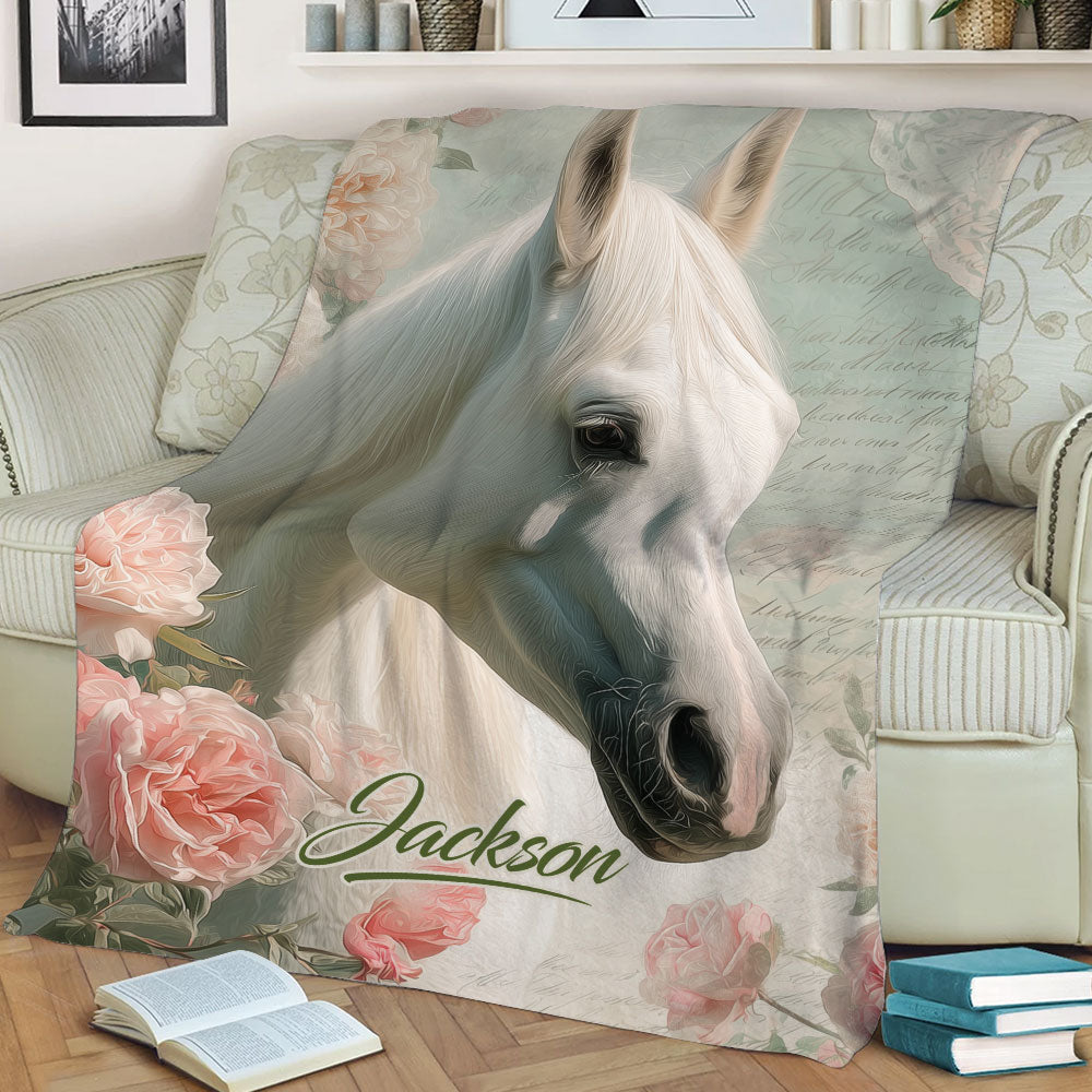 Close view of a floral horse throw blanket displaying a white horse portrait in a cozy living room setting