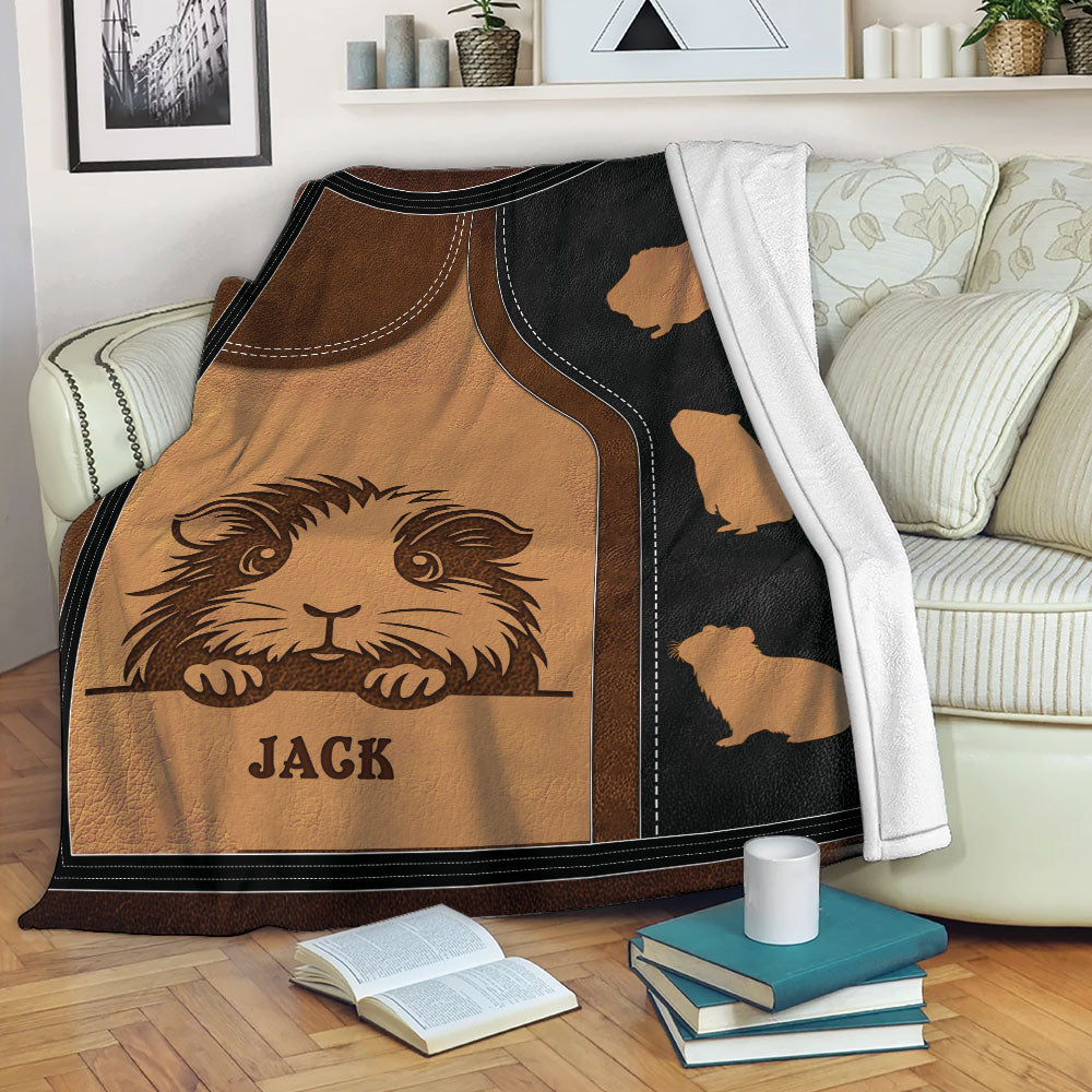 Guinea pig throw blanket draped over a sofa with brown and black pet artwork