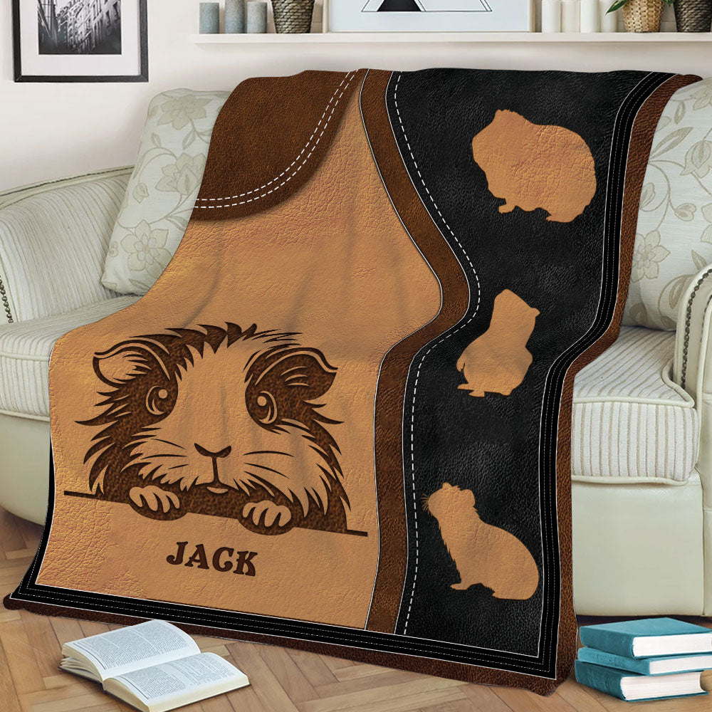 Close view of a guinea pig throw blanket featuring illustrated guinea pigs in a cozy living room
