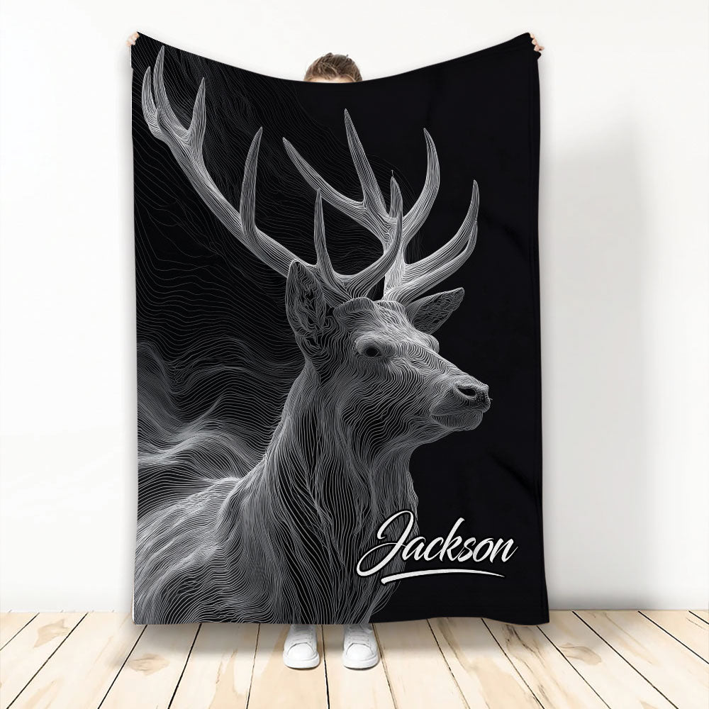 Black throw blanket featuring a detailed white line-art stag with large antlers