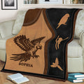 Close view of a conure blanket with an illustrated parrot, flying bird accents, and rustic brown and black artwork
