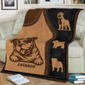 Close view of English Bulldog throw blanket artwork displayed across a living room sofa