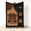 School bus throw blanket with vintage brown and black bus artwork displayed in a room