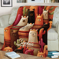 Close lifestyle view of a vibrant alpaca blanket with patterned alpacas and Southwestern desert colors