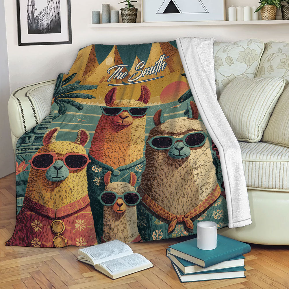 Alpaca blanket draped over a sofa showing colorful alpaca artwork and tropical decor