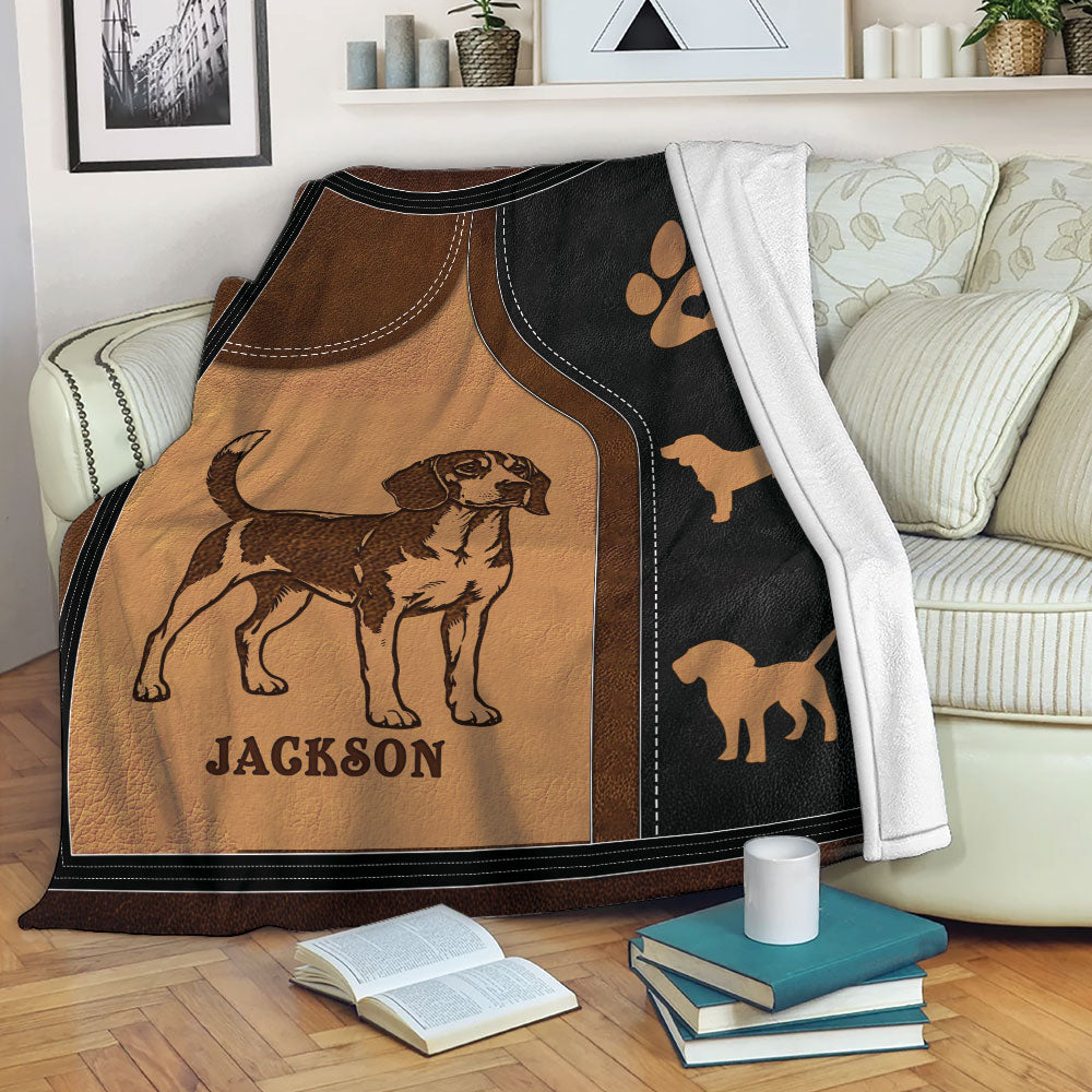 Beagle throw blanket displayed on a sofa with warm brown and black dog-themed artwork