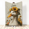 Custom duck blanket featuring a white duck surrounded by sunflowers and colorful botanical flowers