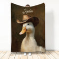 Duck throw blanket featuring a duck in a cowboy hat against a rustic brown background