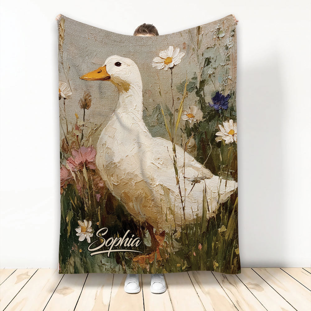 Duck throw blanket featuring a white duck in a painterly wildflower meadow