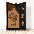 Texas throw blanket with rustic western artwork, cowboy hat, cactus, Lone Star, and Texas state design