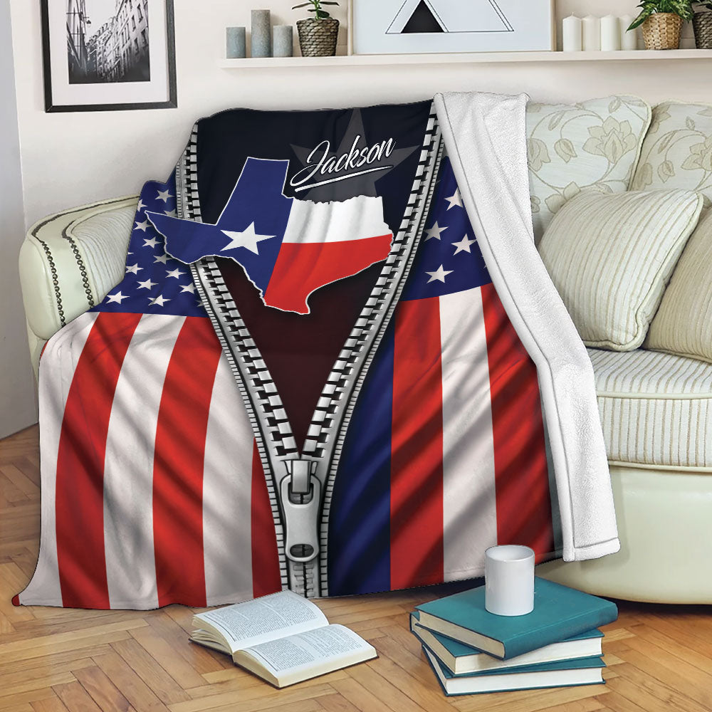 Custom Texas blanket displayed on a sofa with patriotic red, white, and blue state artwork