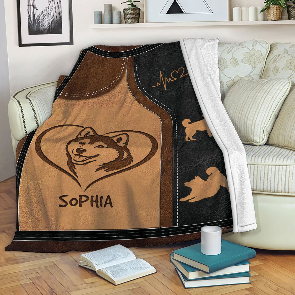 Custom Shiba Inu blanket displayed over a sofa with dog silhouette border artwork