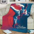 Karate throw blanket displayed on a couch with energetic martial artist artwork