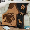 Close view of Bluetick Coonhound throw blanket with coonhound, raccoon and paw print design