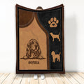 Bloodhound throw blanket with vintage brown and black artwork, paw print, and dog silhouettes