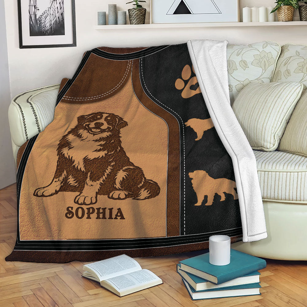 Bernese Mountain Dog blanket draped over a sofa, featuring rustic breed artwork and paw print design