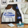 Paramedic throw blanket displayed on a sofa with ambulance and blue EMS medical artwork